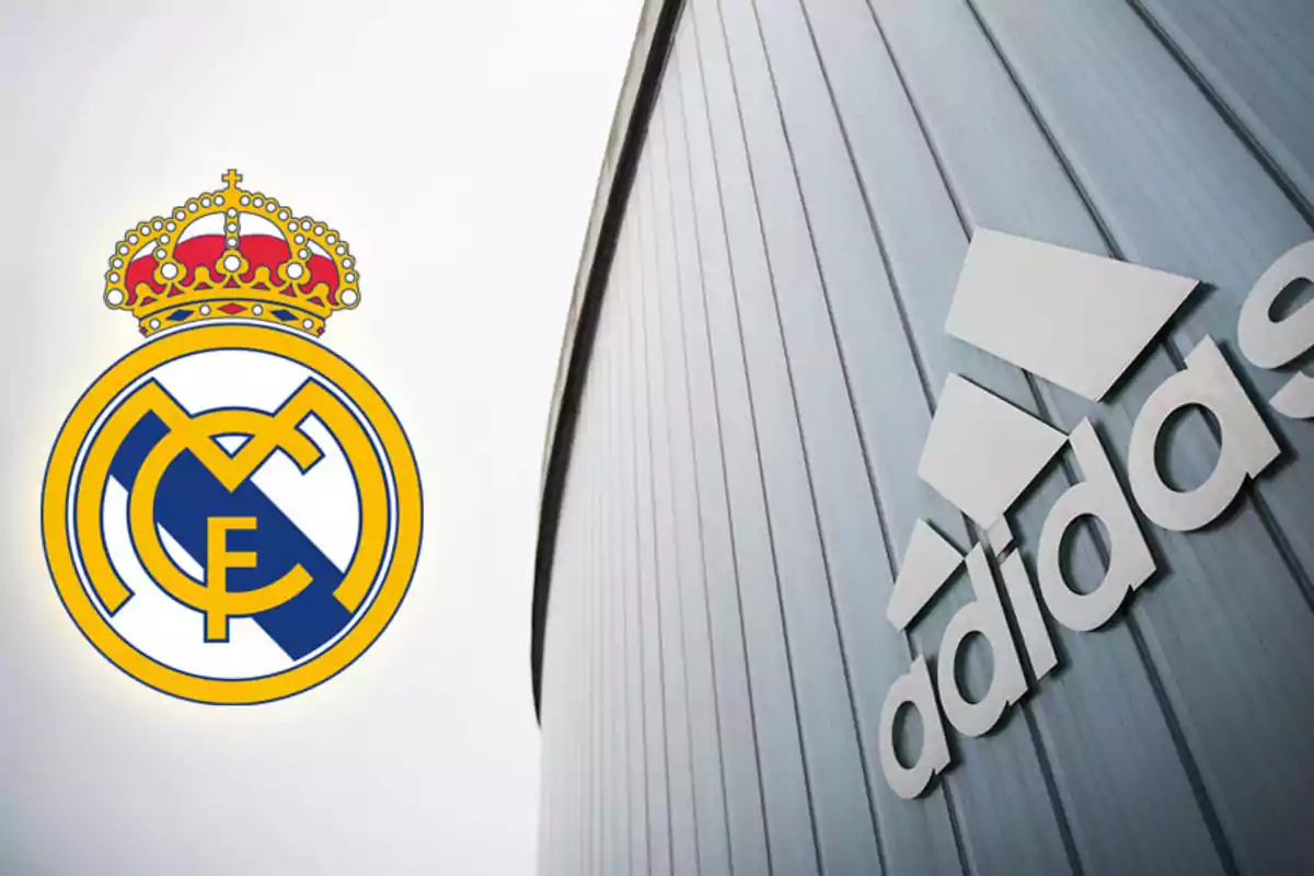 Logotipo del Real Madrid junto al logotipo de Adidas en un edificio.