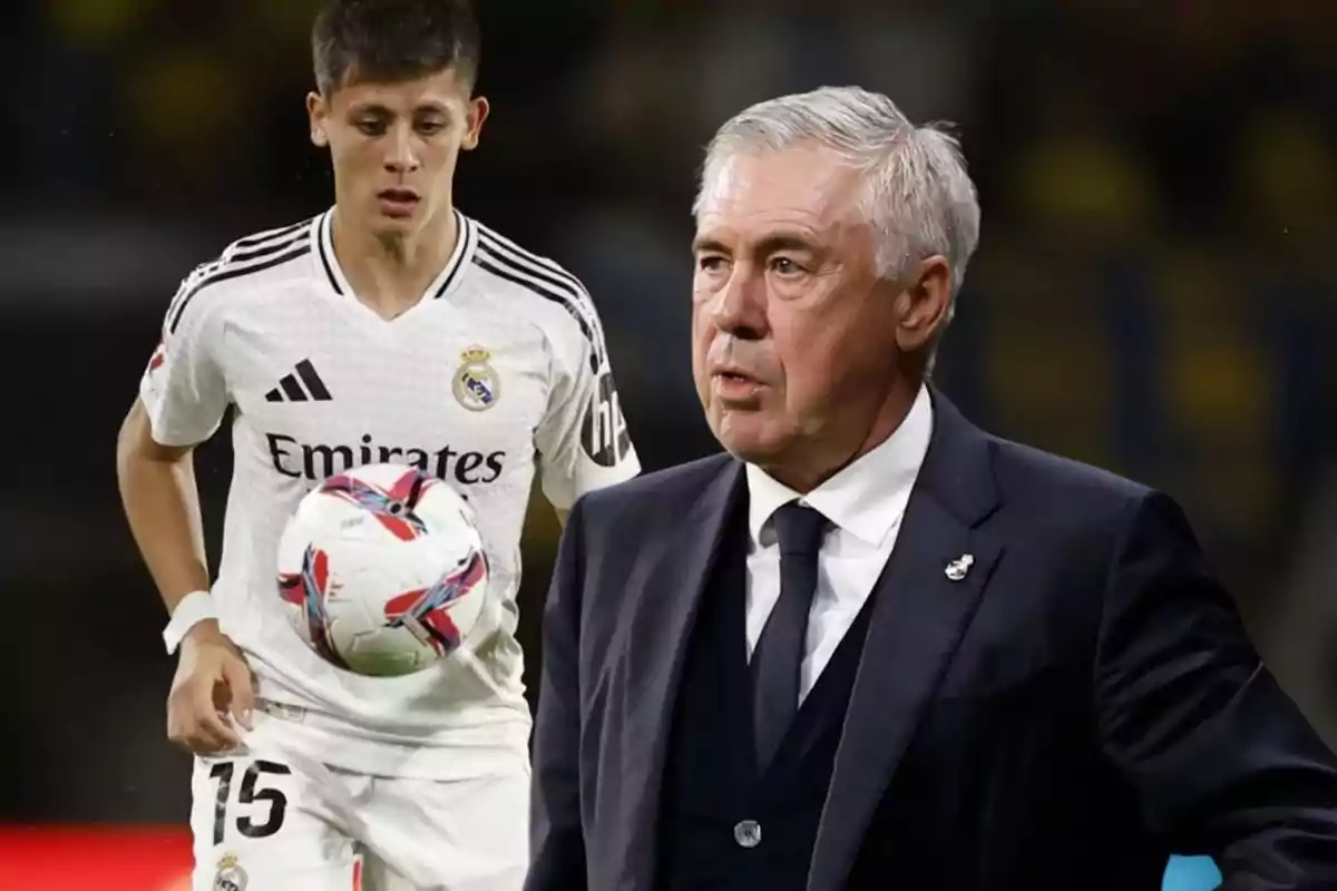 Un jugador de fútbol del Real Madrid con el balón y un hombre de traje en primer plano.