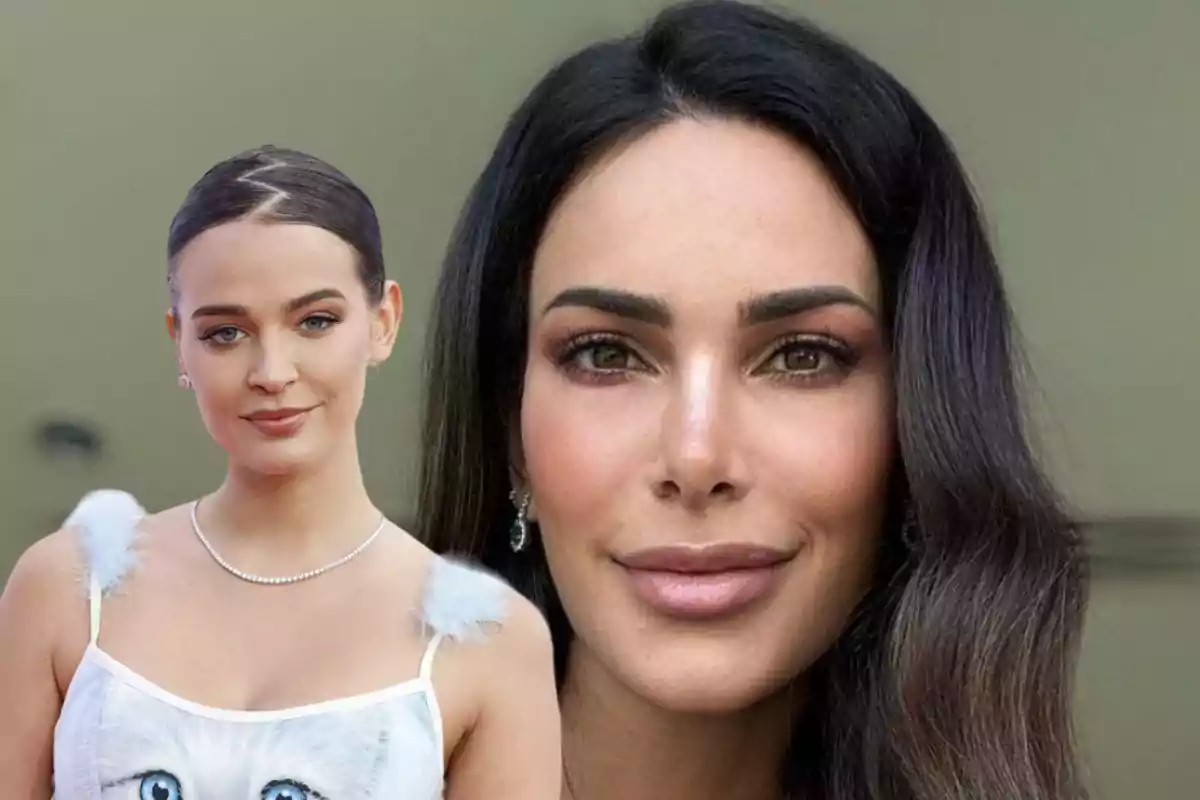 Dos mujeres posando juntas, una con cabello recogido y vestido blanco con diseño de gato, y la otra con cabello suelto y oscuro.