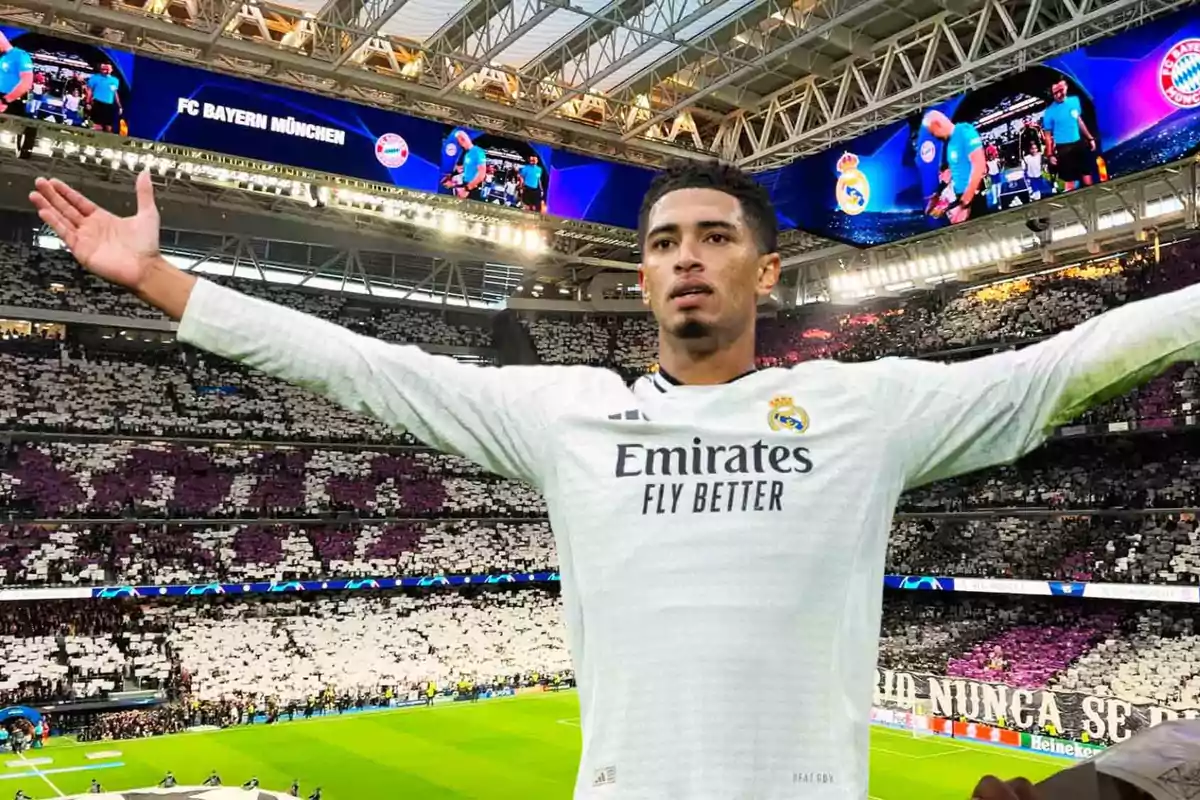 Jugador del Real Madrid celebrando en el estadio con el público de fondo.