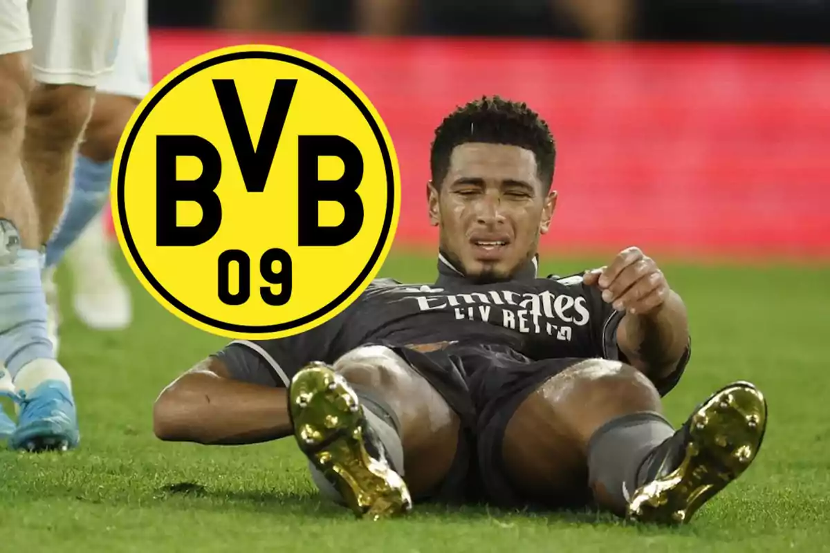 Jugador de fútbol en el suelo con expresión de dolor y el logo del Borussia Dortmund superpuesto.