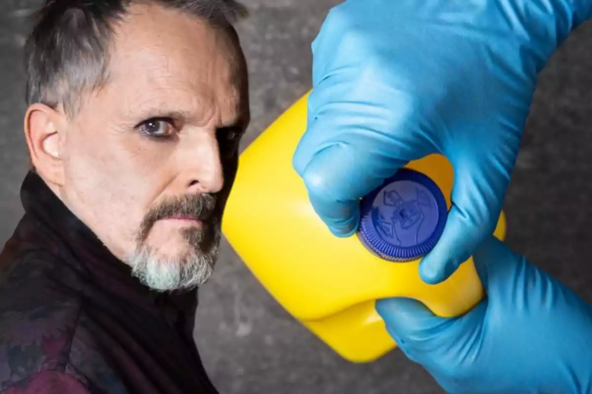 Un hombre con barba y cabello corto mira hacia la cámara mientras una mano con guante azul sostiene un recipiente amarillo con tapa azul.