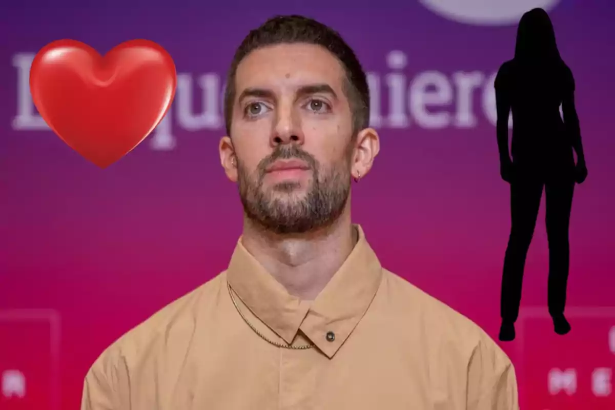 Un hombre con barba y cabello corto está de pie frente a un fondo púrpura, acompañado de un emoji de corazón rojo y la silueta de una mujer.