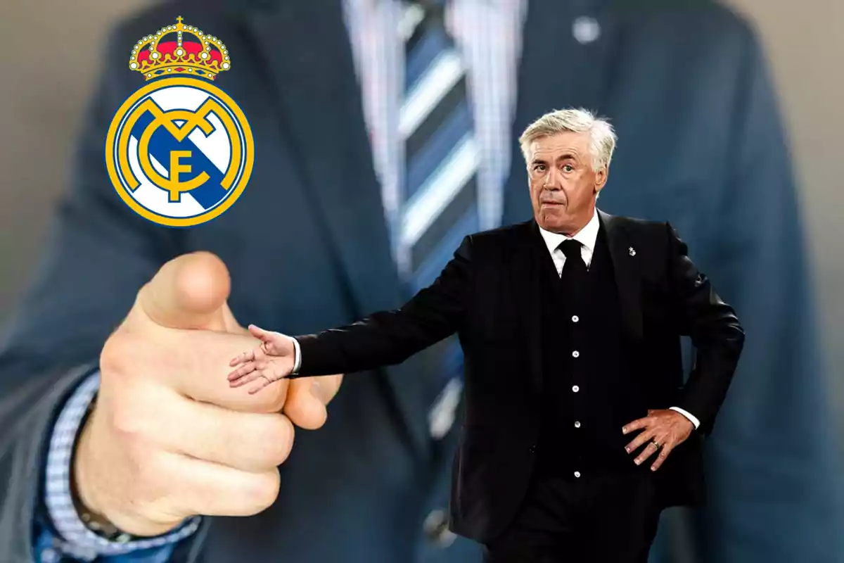 Un hombre de traje señalando con el dedo, con el escudo del Real Madrid y un entrenador en primer plano.