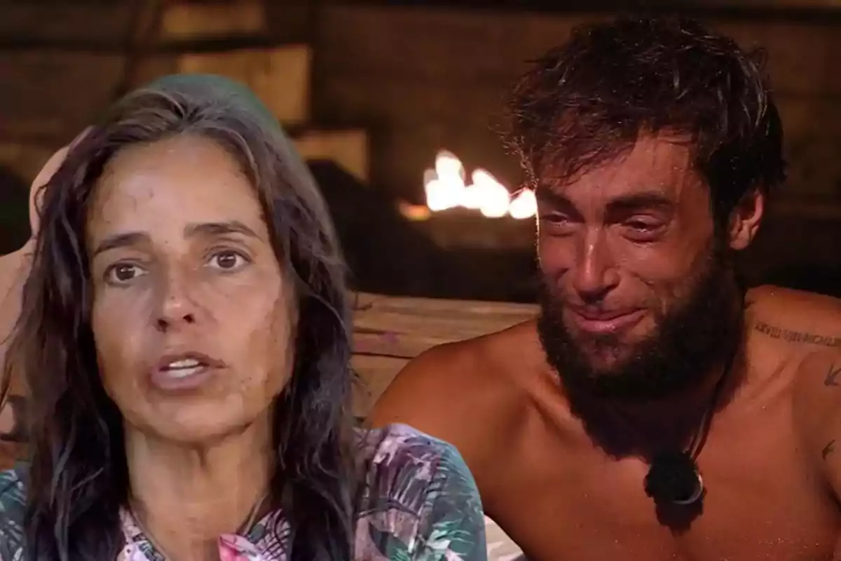 Dos personas con expresiones emocionales intensas en un entorno rústico con fuego de fondo