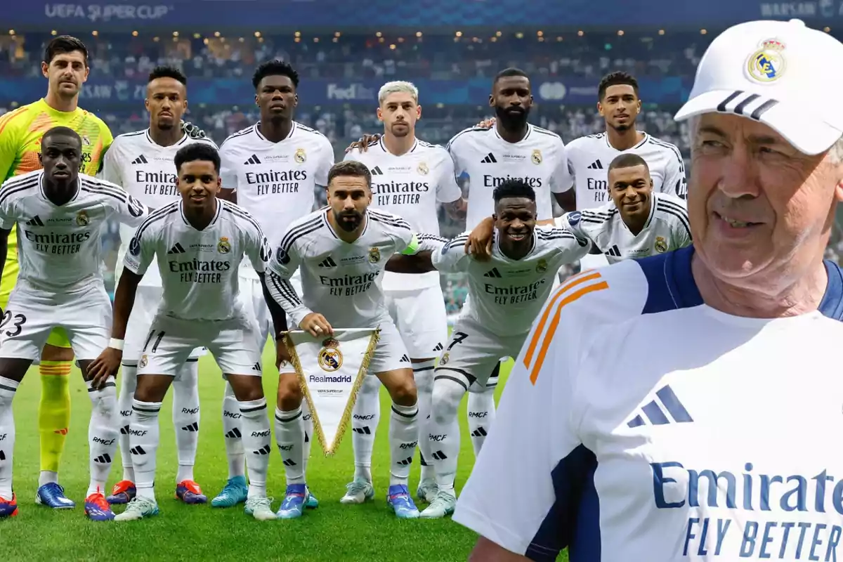 Jugadores de un equipo de fútbol posan para una foto grupal en el campo, mientras que un hombre con una gorra y camiseta del mismo equipo aparece en primer plano.