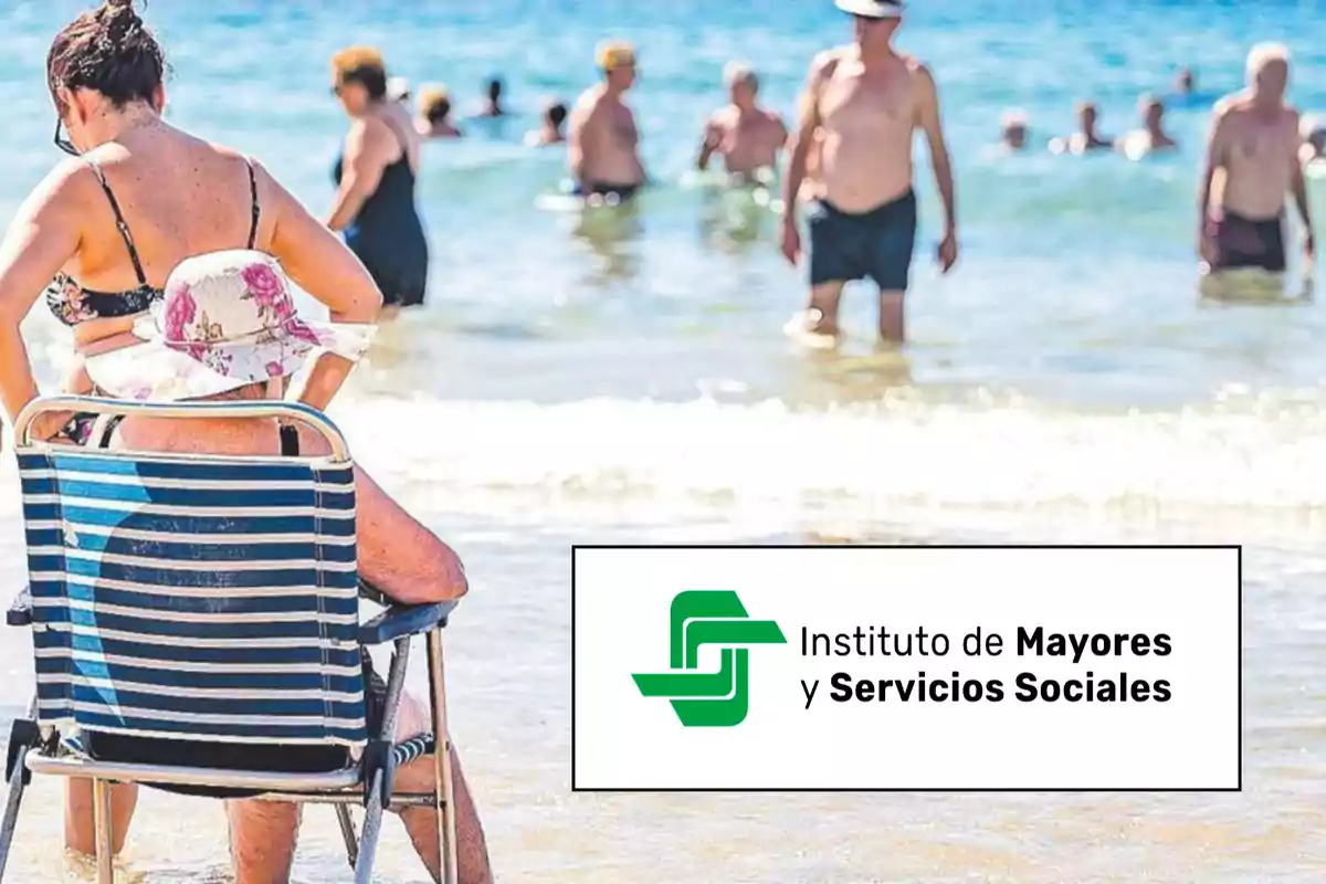 Personas mayores disfrutando de la playa con el logo del Instituto de Mayores y Servicios Sociales.