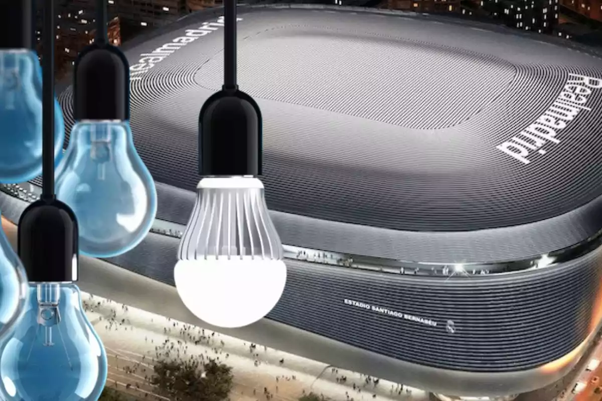 Estadio moderno iluminado con varias bombillas colgantes en primer plano.