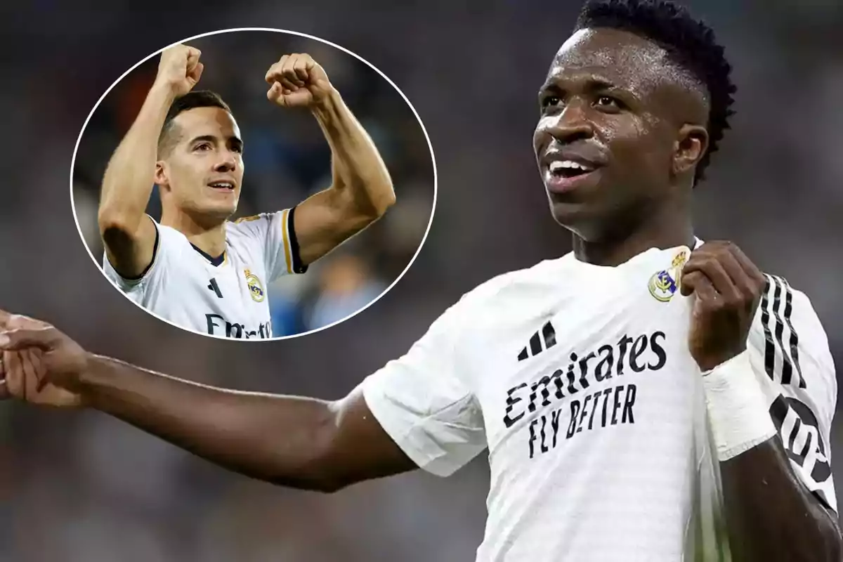 Dos jugadores de fútbol del Real Madrid celebrando en el campo, uno de ellos levantando los brazos y el otro señalando y sosteniendo el escudo del equipo en su camiseta.