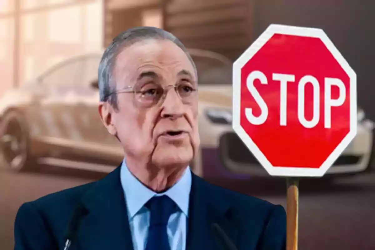 Florentino Pérez con una señal de stop al lado y un coche desenfocado en el fondo.