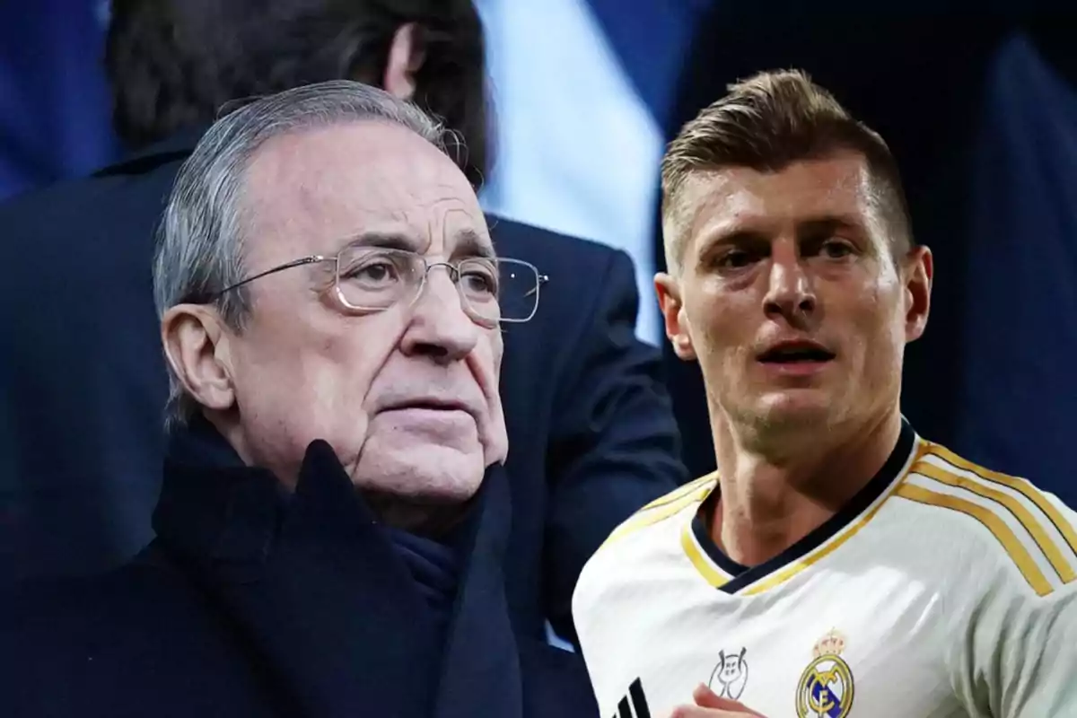 Dos hombres, uno con gafas y abrigo oscuro y otro con camiseta de fútbol blanca del Real Madrid, posan juntos.