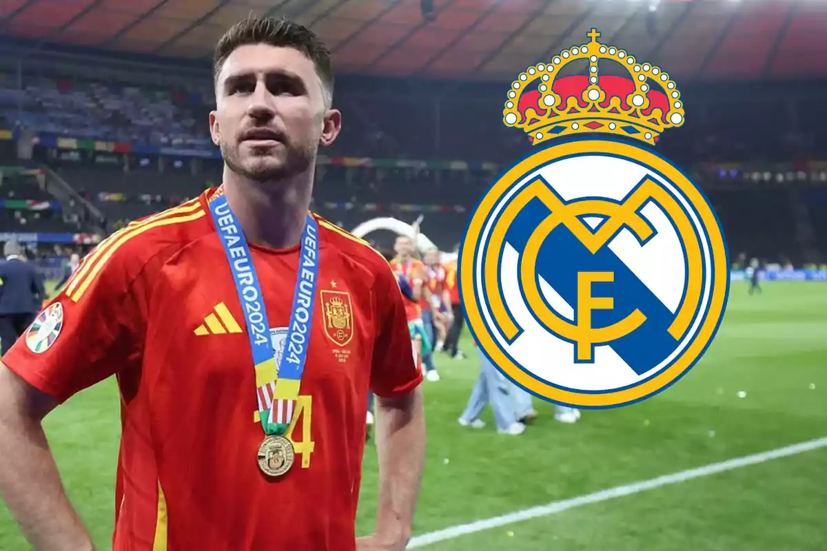 Jugador de fútbol con la camiseta de la selección española y medalla de la UEFA Euro 2024, con el escudo del Real Madrid al fondo.