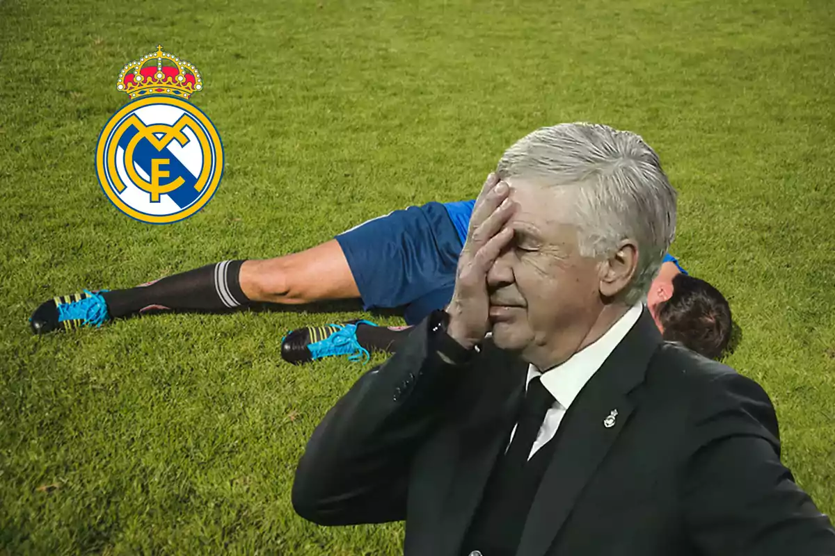 Un entrenador de fútbol se tapa la cara con la mano mientras un jugador yace en el suelo y el logo del Real Madrid aparece en el fondo.