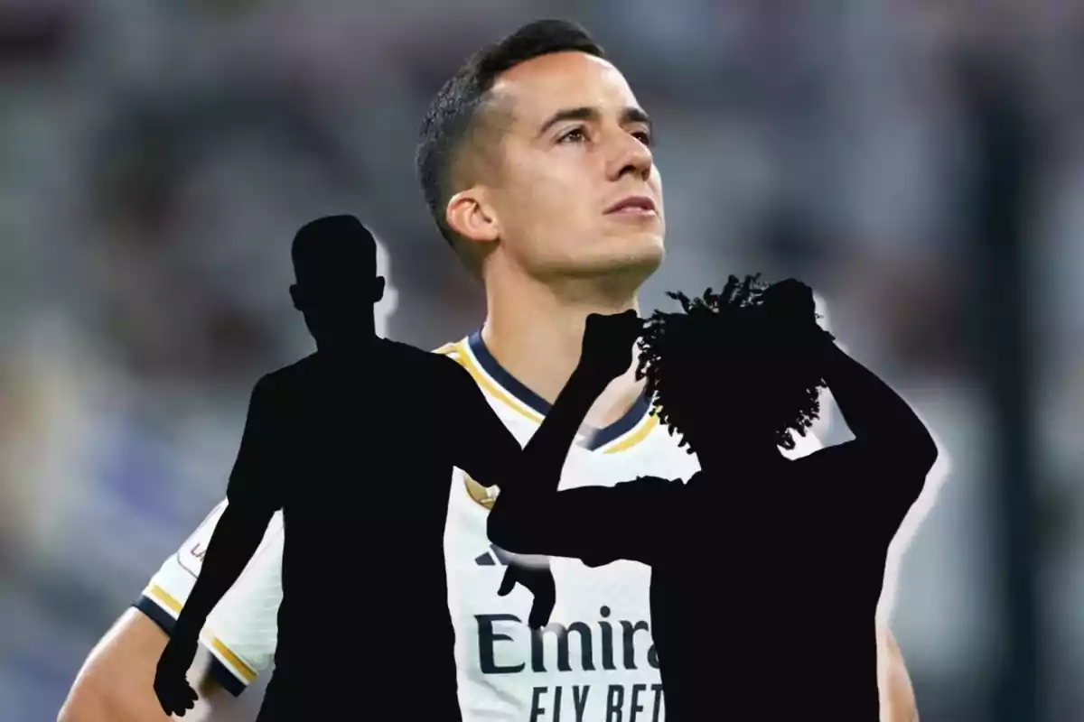 Do siluetas en negro de dos jugadores y de fondo Lucas Vázquez mirando a lo lejos con la camiseta del Real Madrid