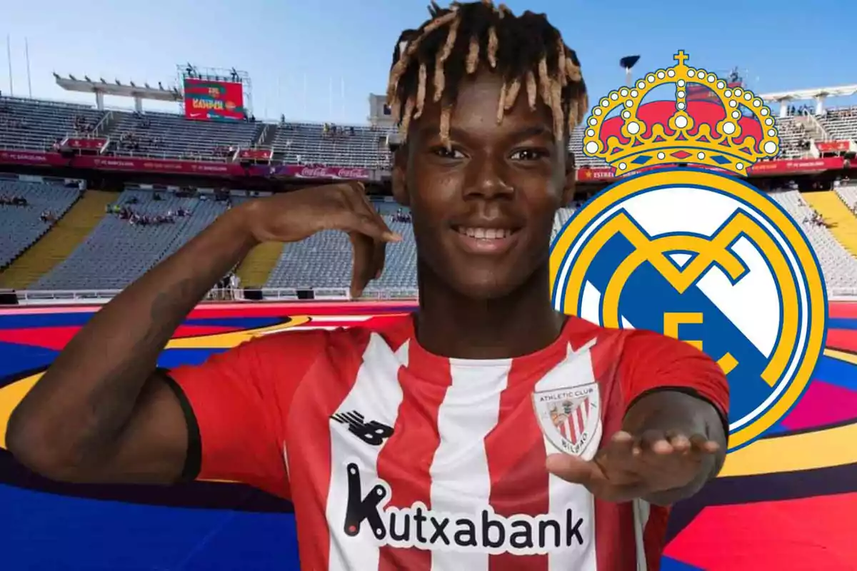 Un jugador de fútbol con la camiseta del Athletic Club de Bilbao sonríe en un estadio con el escudo del Real Madrid al fondo.