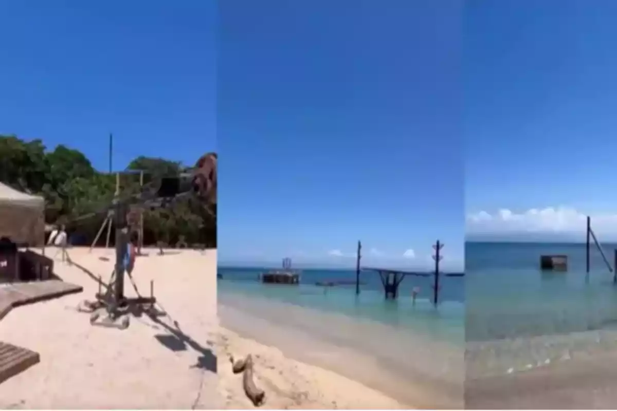 Playa con equipo de grabación y estructuras de madera en el mar bajo un cielo despejado Playa con equipo de grabación y estructuras de madera en el mar bajo un cielo despejado