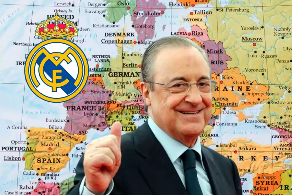 Un hombre con traje sonríe y levanta el pulgar frente a un mapa de Europa, con el escudo del Real Madrid a su lado.