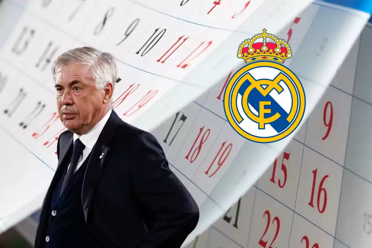 Un hombre de traje frente a un calendario con el logo del Real Madrid.