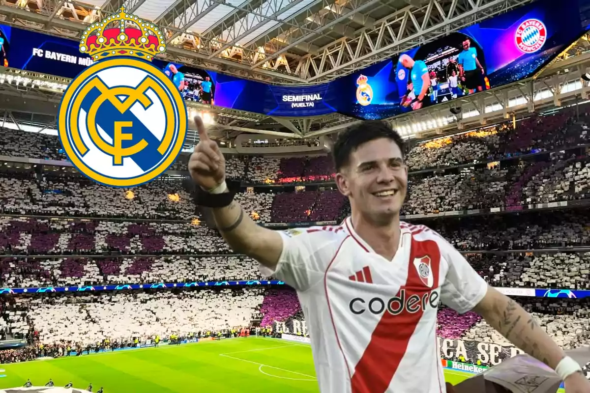 Un jugador de fútbol con una camiseta blanca y roja sonríe y levanta el dedo índice en un estadio lleno de espectadores, con el escudo del Real Madrid superpuesto en la imagen.