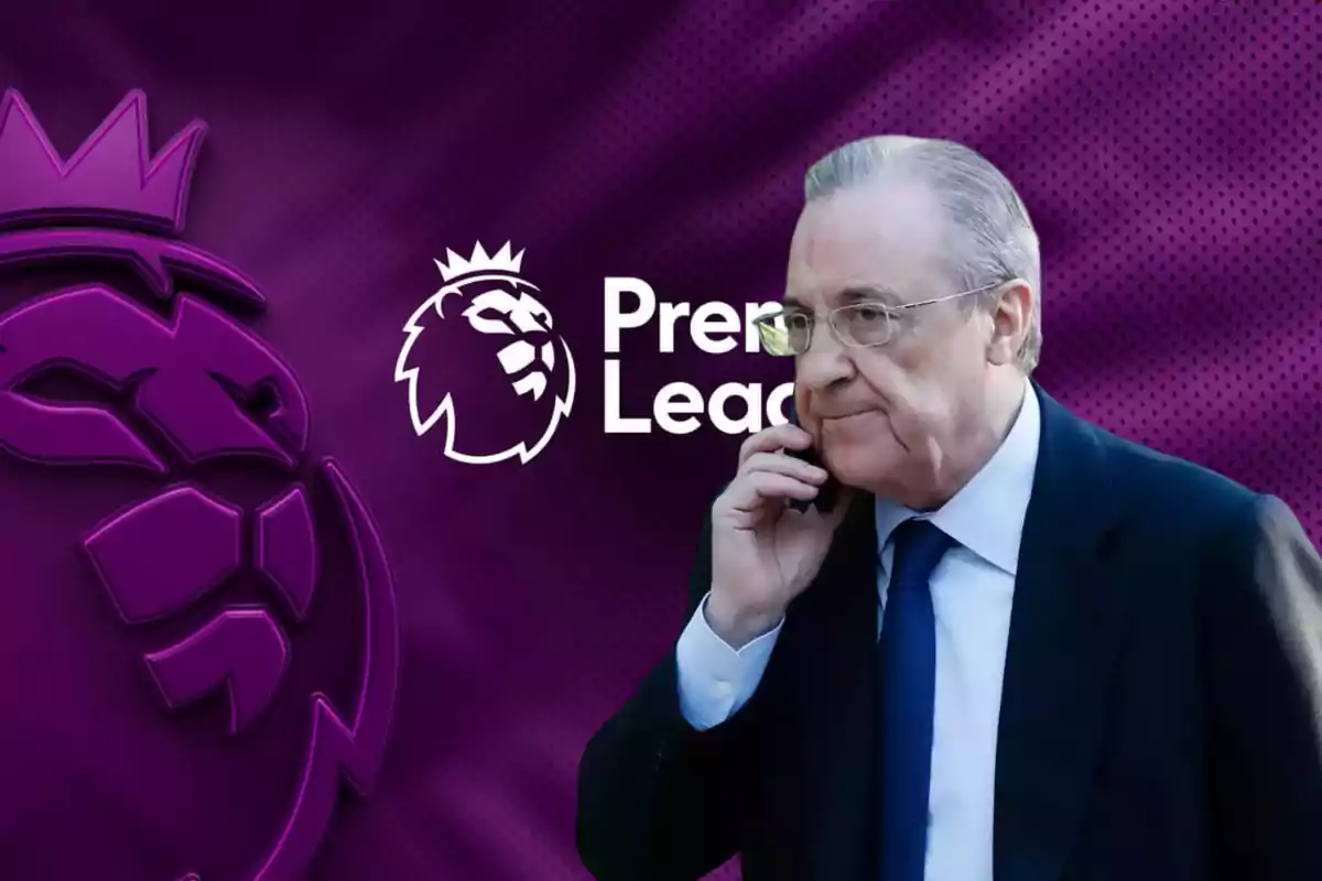 Un hombre hablando por teléfono frente a un fondo con el logo de la Premier League.