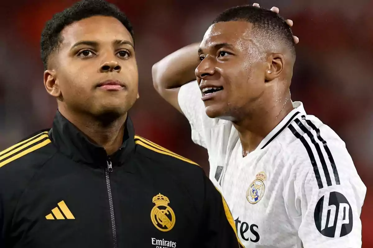 Dos jugadores de fútbol del Real Madrid, uno con chaqueta negra y el otro con camiseta blanca, en un campo de fútbol.