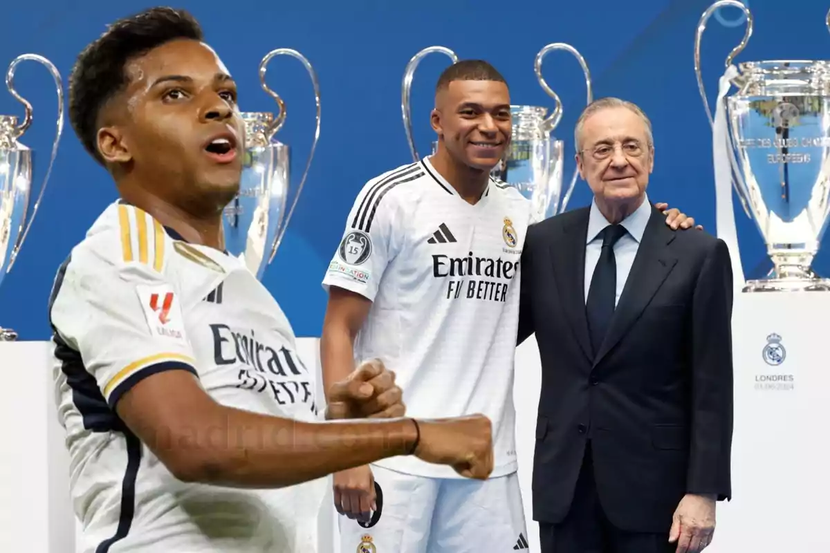 En la imagen se observan tres personas, dos de ellas con uniformes de fútbol del Real Madrid y una tercera persona con traje, posando frente a varios trofeos de la Liga de Campeones de la UEFA.