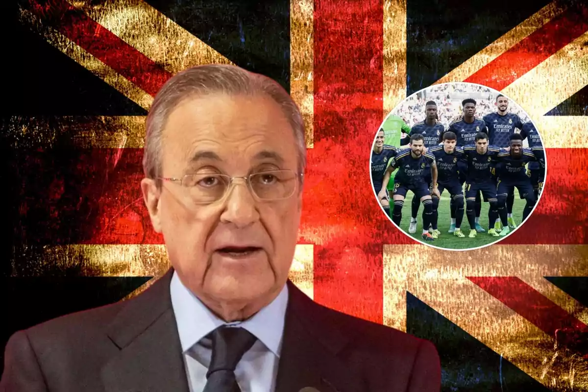 Un hombre con gafas y traje oscuro está hablando frente a un micrófono, con una bandera del Reino Unido de fondo y una imagen circular de un equipo de fútbol en la esquina superior derecha.