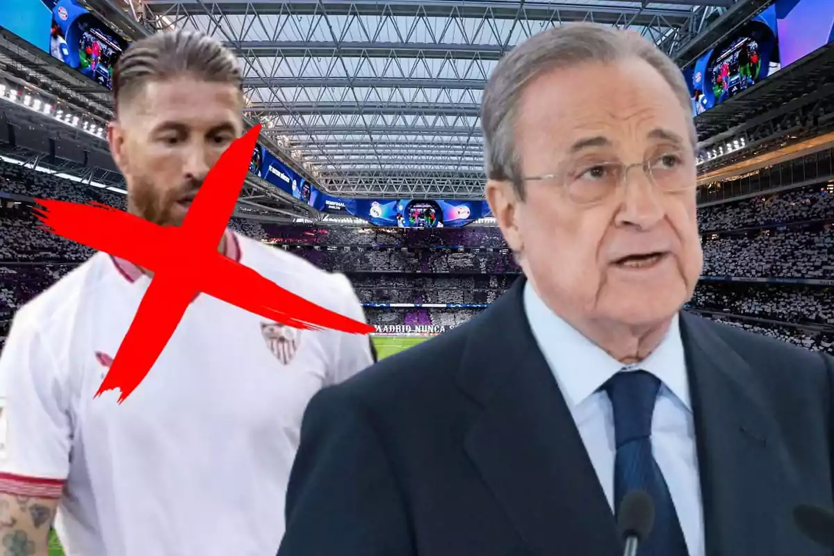 Un hombre con una camiseta de fútbol blanca tiene una gran cruz roja sobre él mientras otro hombre mayor con gafas y traje habla en un estadio lleno de gente.