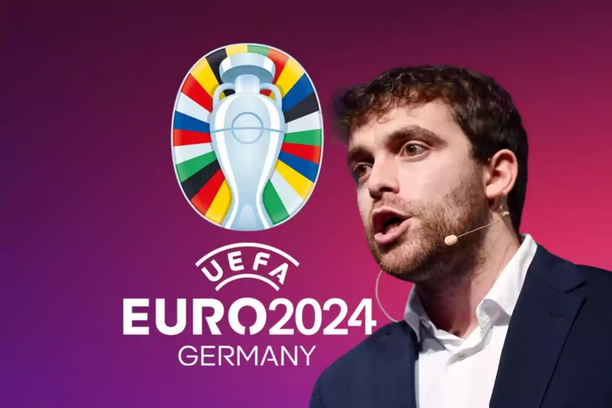 Hombre hablando con un micrófono de diadema junto al logo de la UEFA Euro 2024 en Alemania.