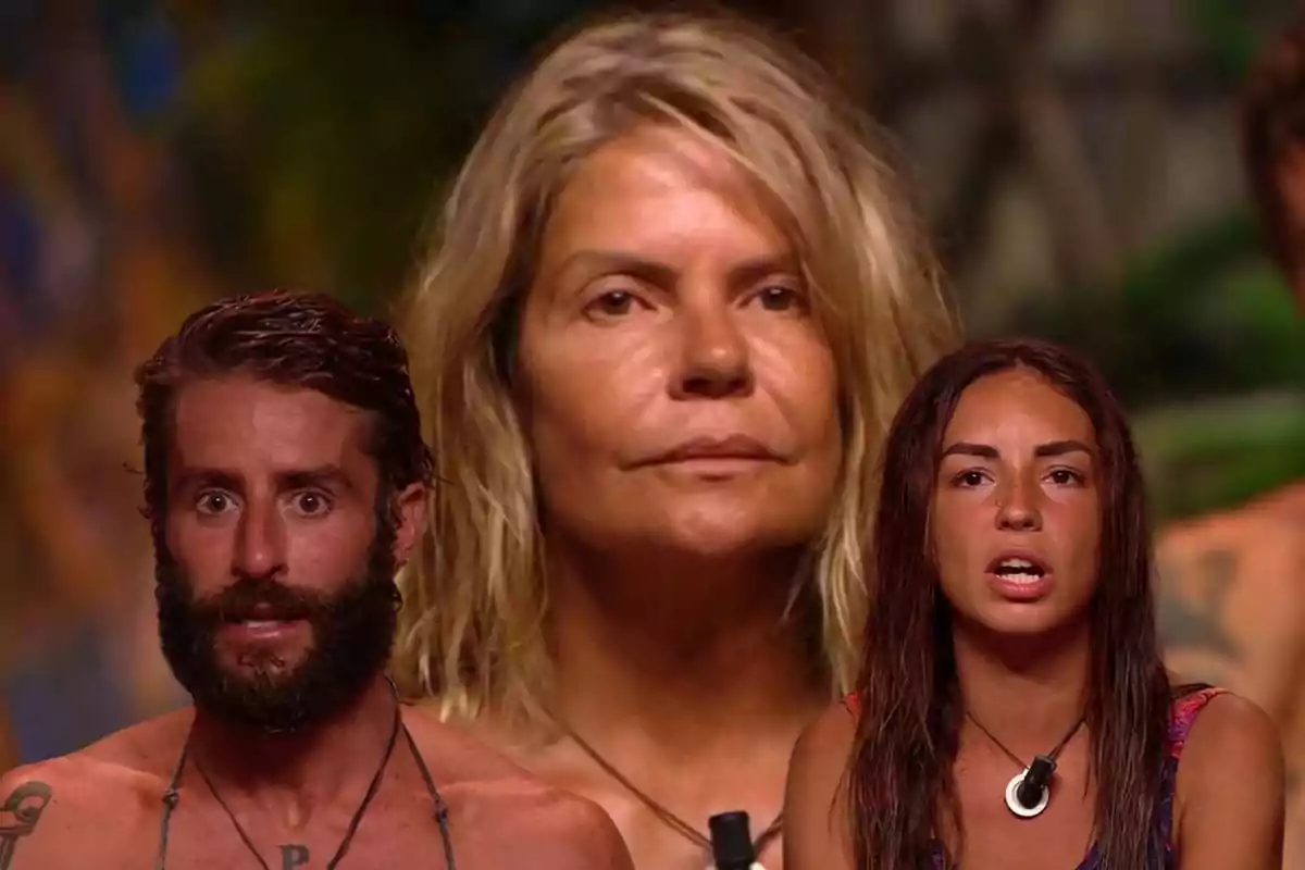 Tres personas con expresiones serias y sorprendidas en un entorno de reality show.
